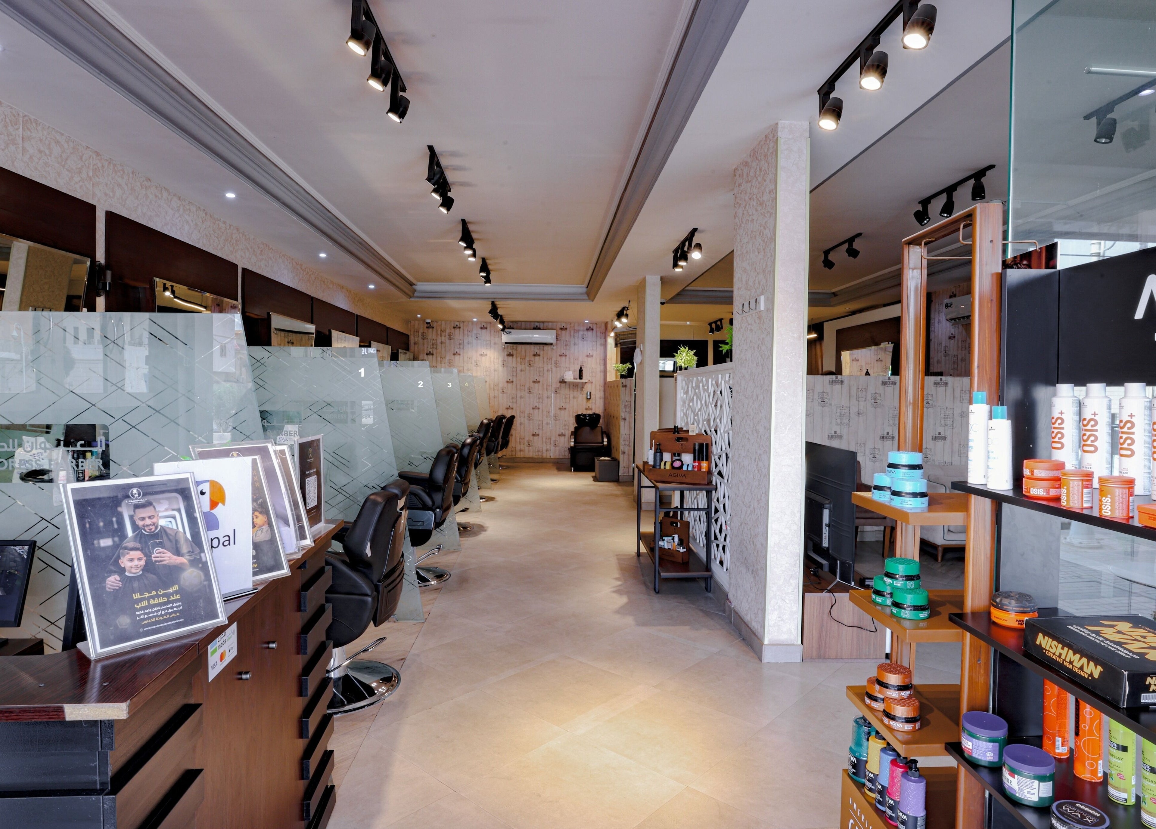 Modern interior of The Address Barber | صالون العنوان المونسيه in Riyadh, Riyadh Province, SA with stylish decor.