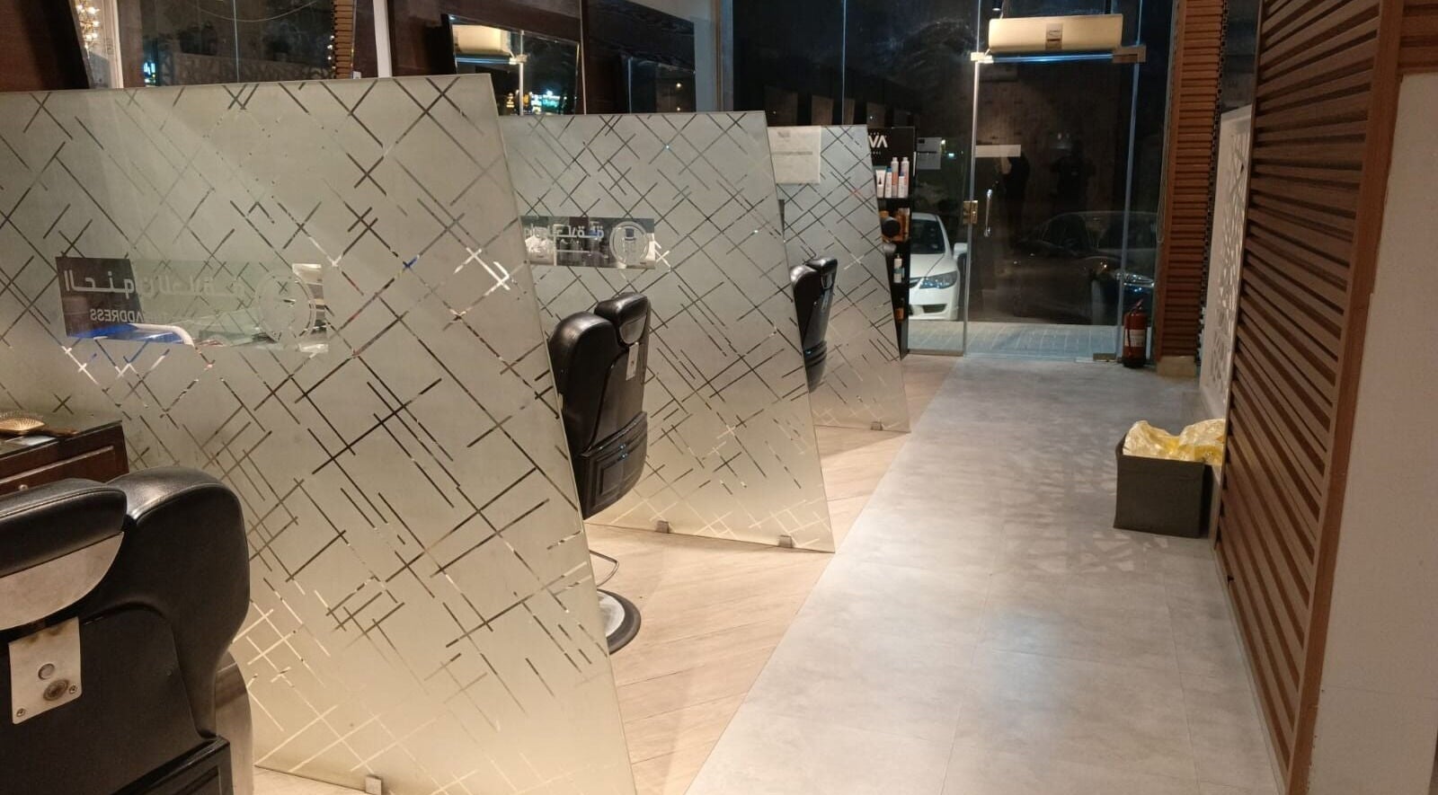 Modern barber chairs at The Address Barber | صالون العنوان المونسيه in Riyadh, Riyadh Province, SA.