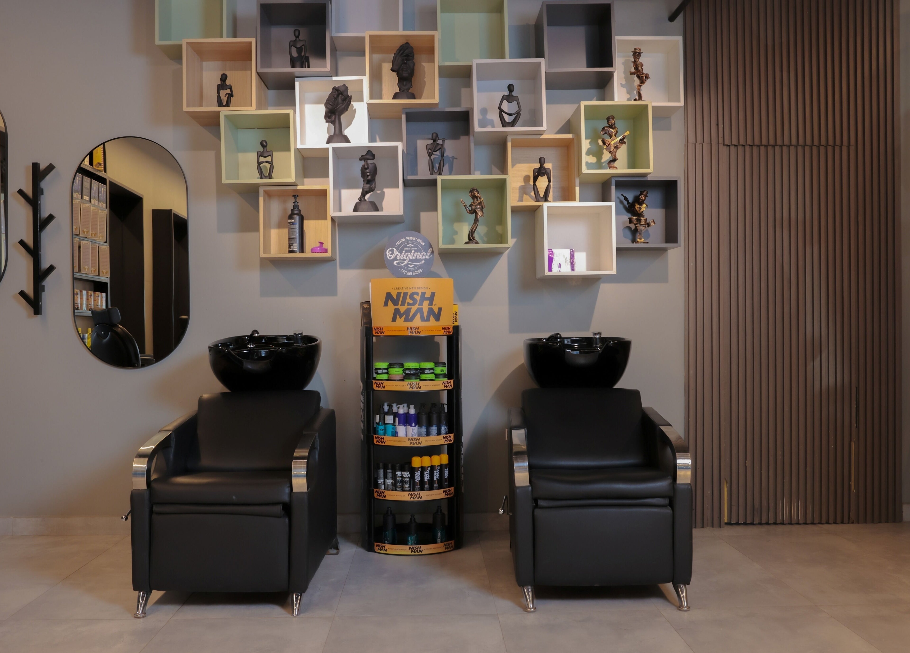 Sophisticated salon chairs and decor at The Address Barber | صالون العنوان قرطبة, Riyadh, Riyadh Province, SA.