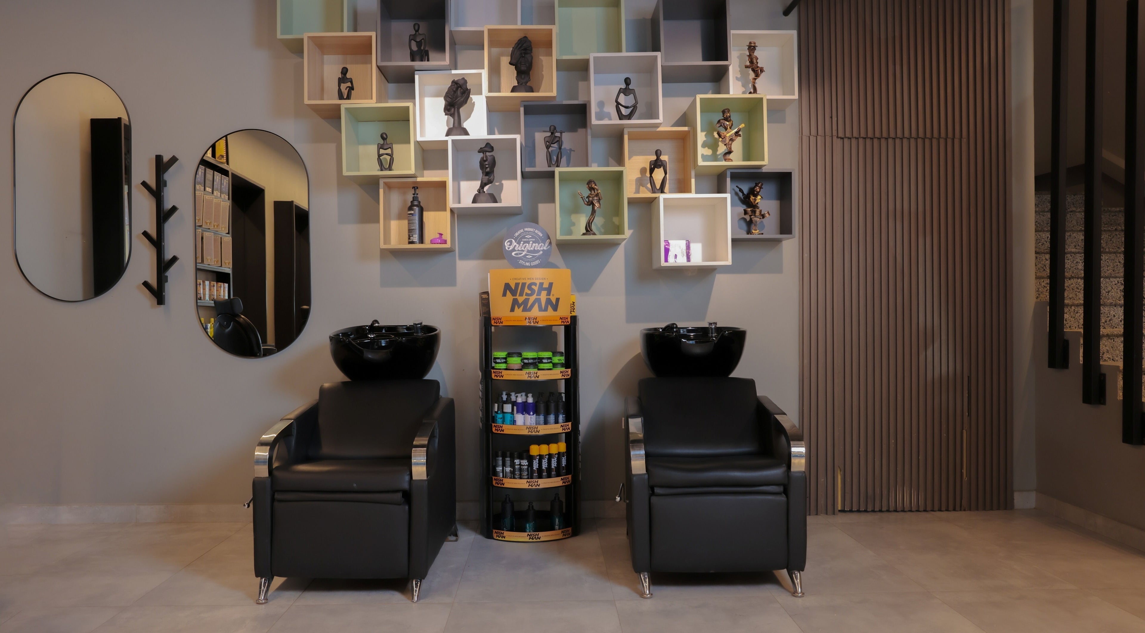 Sophisticated salon chairs and decor at The Address Barber | صالون العنوان قرطبة, Riyadh, Riyadh Province, SA.