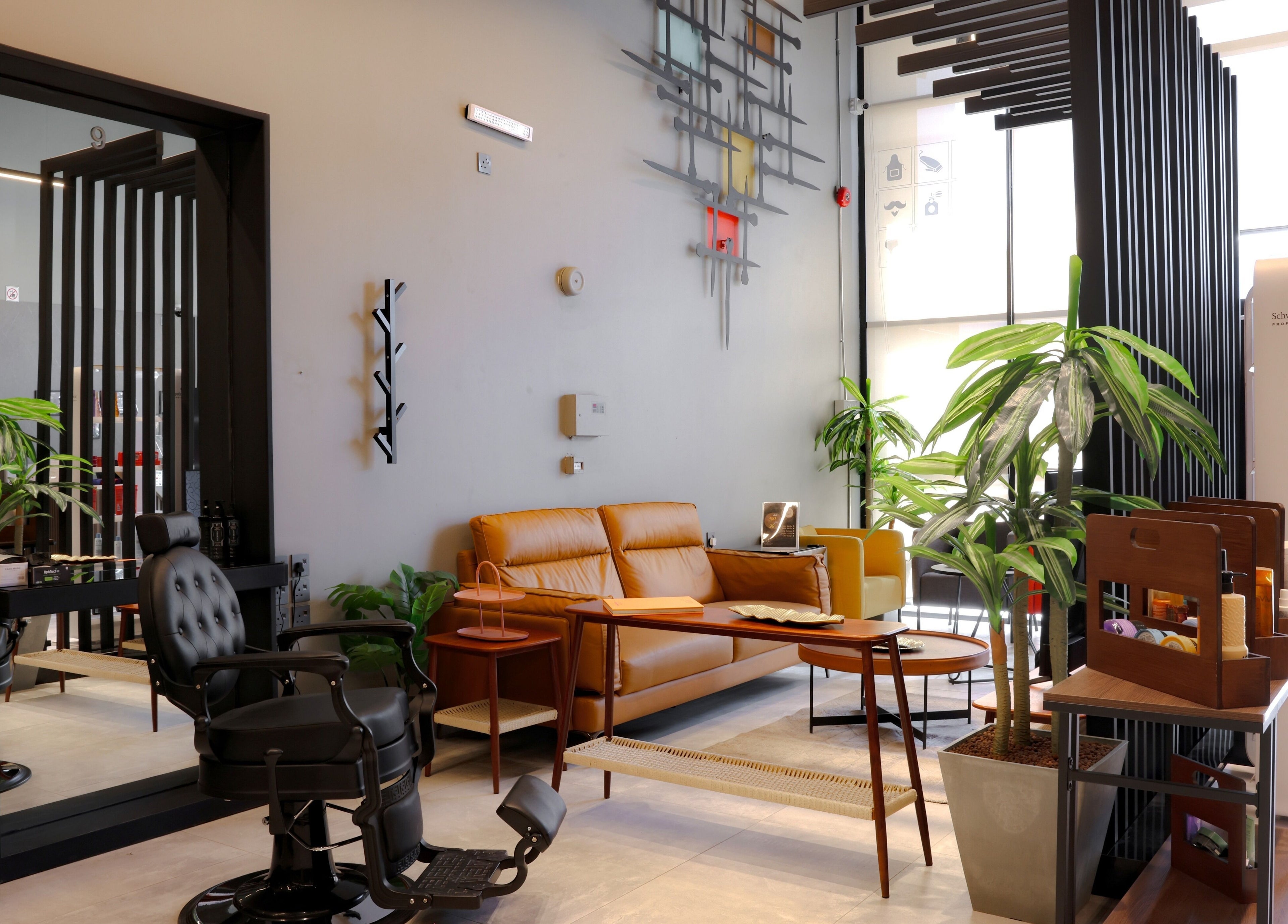 Modern barbershop interior at The Address Barber | صالون العنوان قرطبة, Riyadh, Riyadh Province, SA with chic decor.