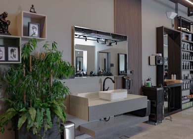 Modern interior of The Address Barber in Riyadh, featuring chic decor and sleek styling stations.