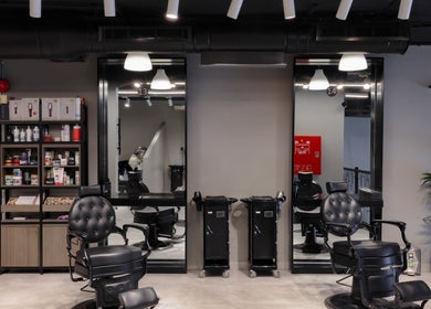 Sophisticated barber chairs at The Address Barber | صالون العنوان العارض in Riyadh, Riyadh Province, SA.