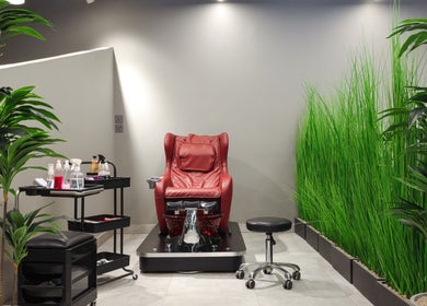 Red massage chair at The Address Barber | صالون العنوان العارض in Riyadh, Riyadh Province, SA.