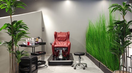 Red massage chair at The Address Barber | صالون العنوان العارض in Riyadh, Riyadh Province, SA.