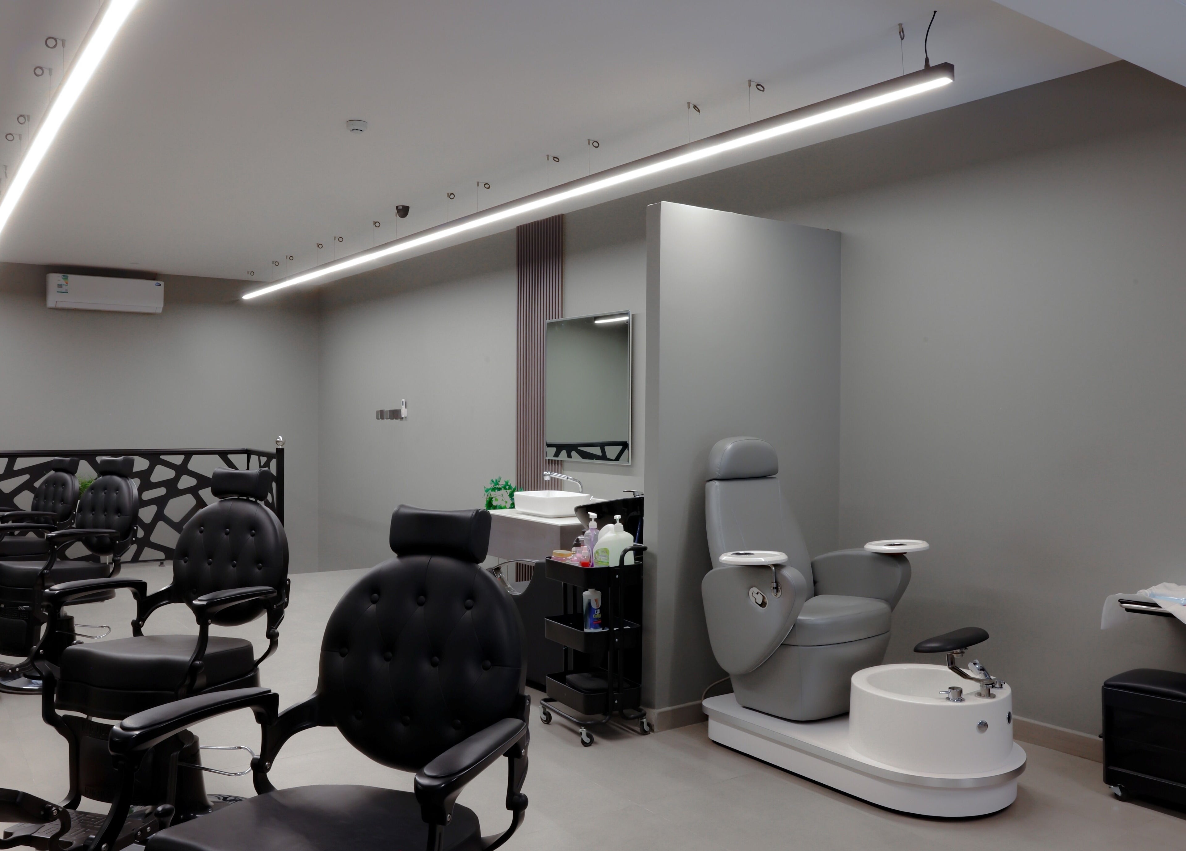 Modern barber chairs at The Address Barber | صالون العنوان القيروان, Riyadh, Riyadh Province, SA.