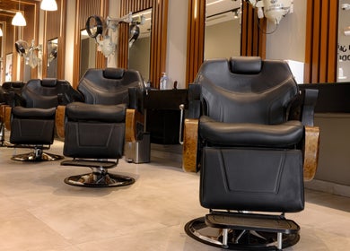Luxe barber chairs at The Address Barber | صالون العنوان القيروان in Riyadh, Riyadh Province, SA.