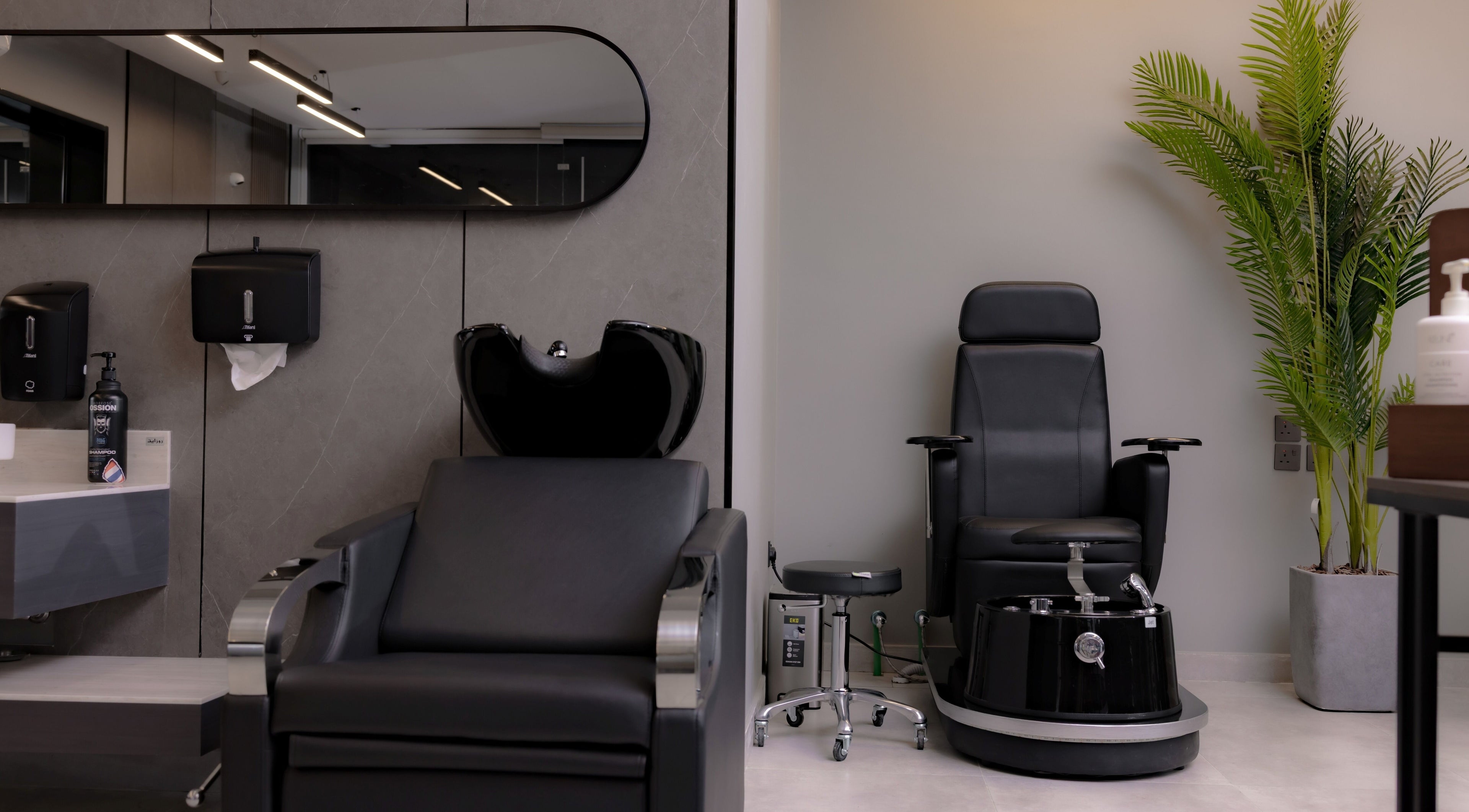 Modern barber chairs at The Address Barber | صالون العنوان النزهة, Riyadh, Riyadh Province, SA, showcasing elegance.