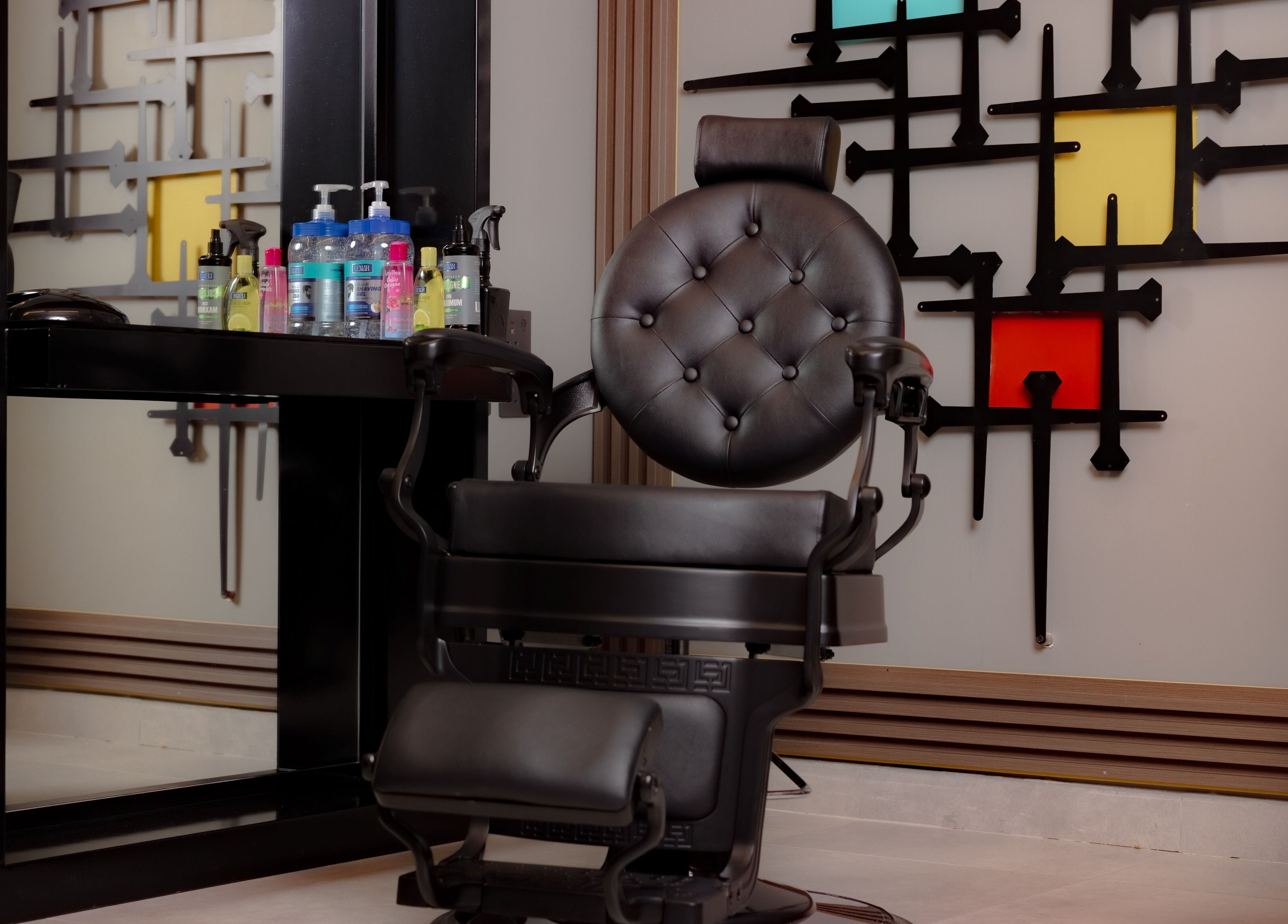 Luxurious barber chair at The Address Barber | صالون العنوان النزهة in Riyadh, Riyadh Province, SA.