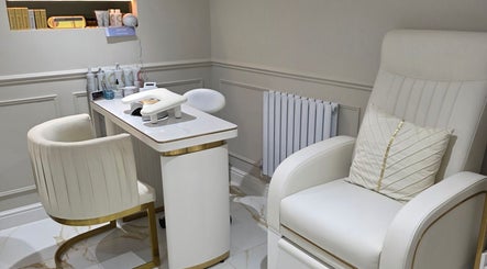 Elegant beauty treatment area at CDT Beauty, Morecambe, England, GB featuring plush seating and modern decor.
