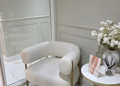 Elegant waiting area with plush chair at CDT Beauty, Morecambe, England, GB.