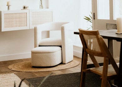 Cozy seating in Ocean Bloom - Helston, featuring a white chair and minimalist decor in Helston, England, GB.