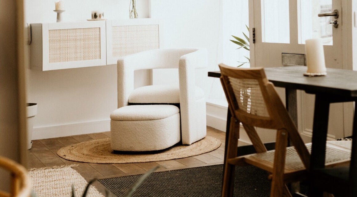 Cozy seating in Ocean Bloom - Helston, featuring a white chair and minimalist decor in Helston, England, GB.