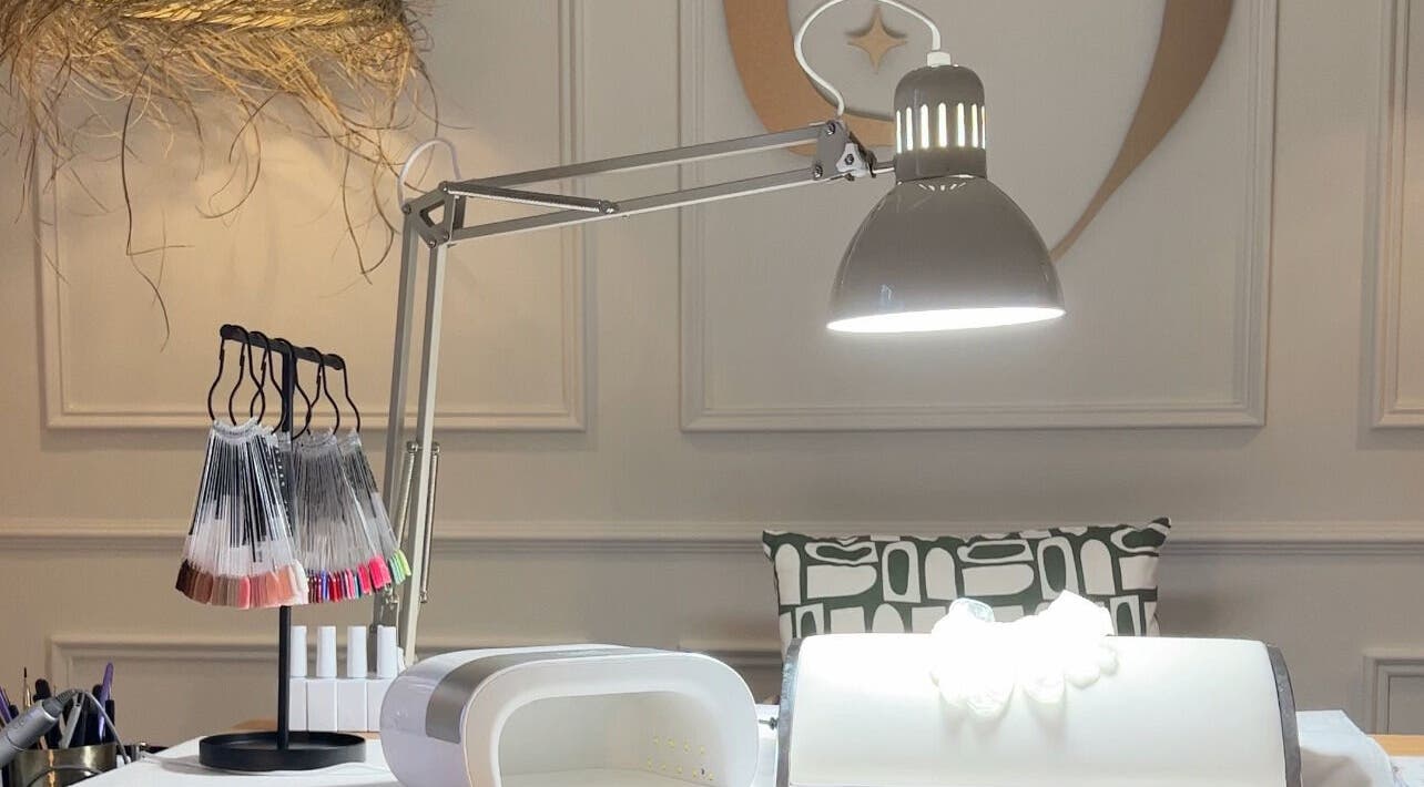 Cozy nail art station at Ocean Bloom - Troon, Camborne, England, GB with modern lighting and equipment.