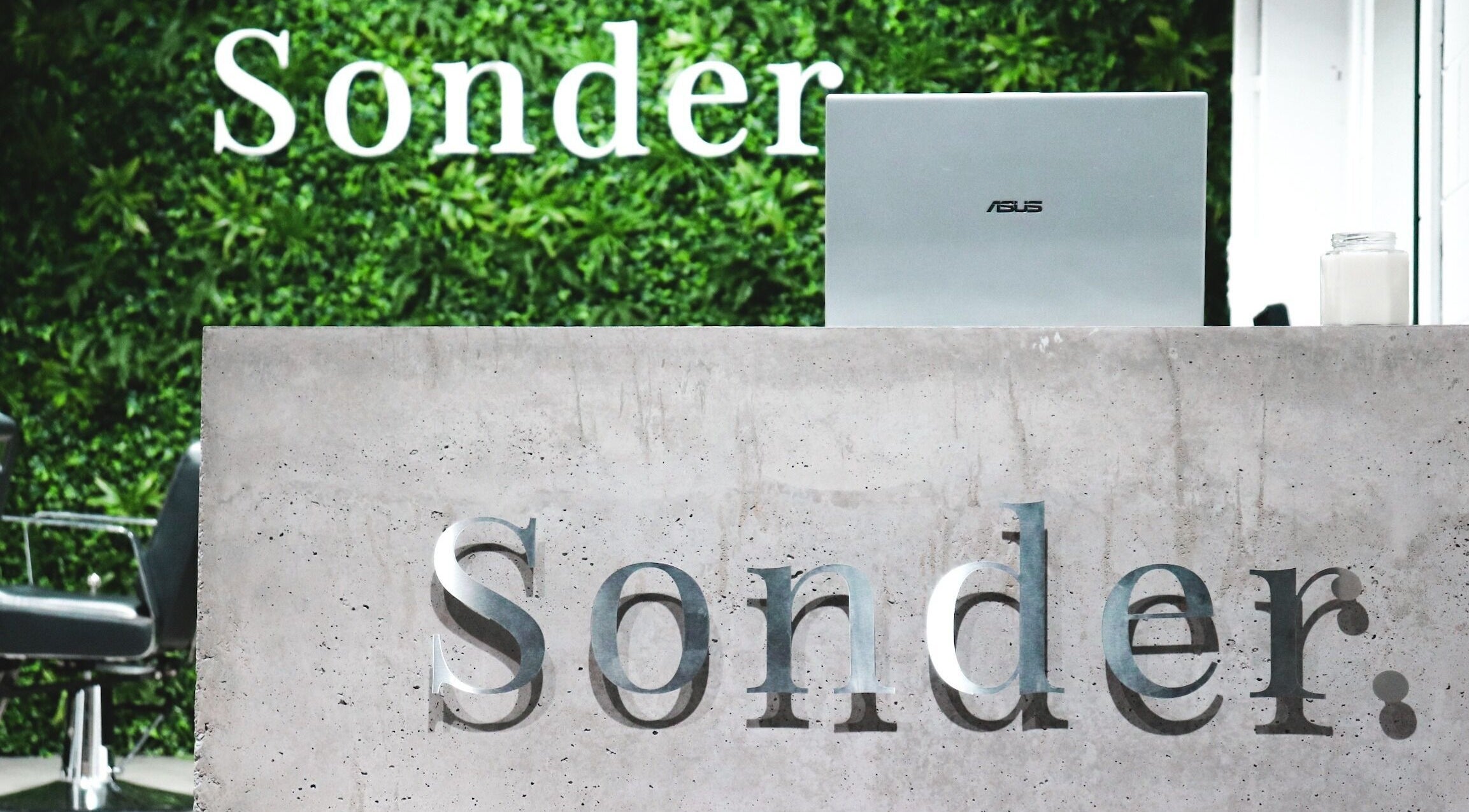 Sleek reception at Sonder Mens | Drummoyne in Drummoyne, New South Wales, AU. Modern aesthetics and green accents.