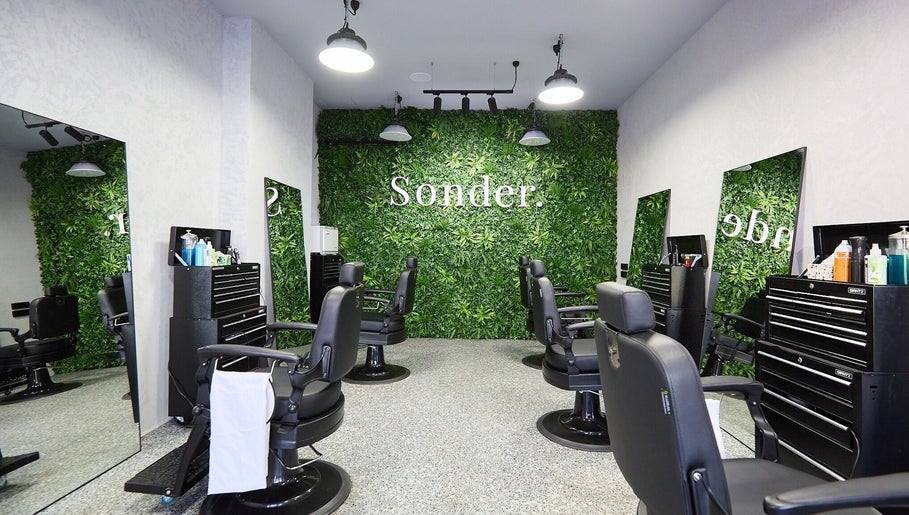 Chic interior of Sonder Mens | Bondi Junction, featuring lush greenery walls in Bondi Junction, New South Wales, AU.