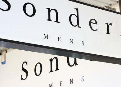 Sonder Mens sign at venue location Bondi Junction, New South Wales, AU.