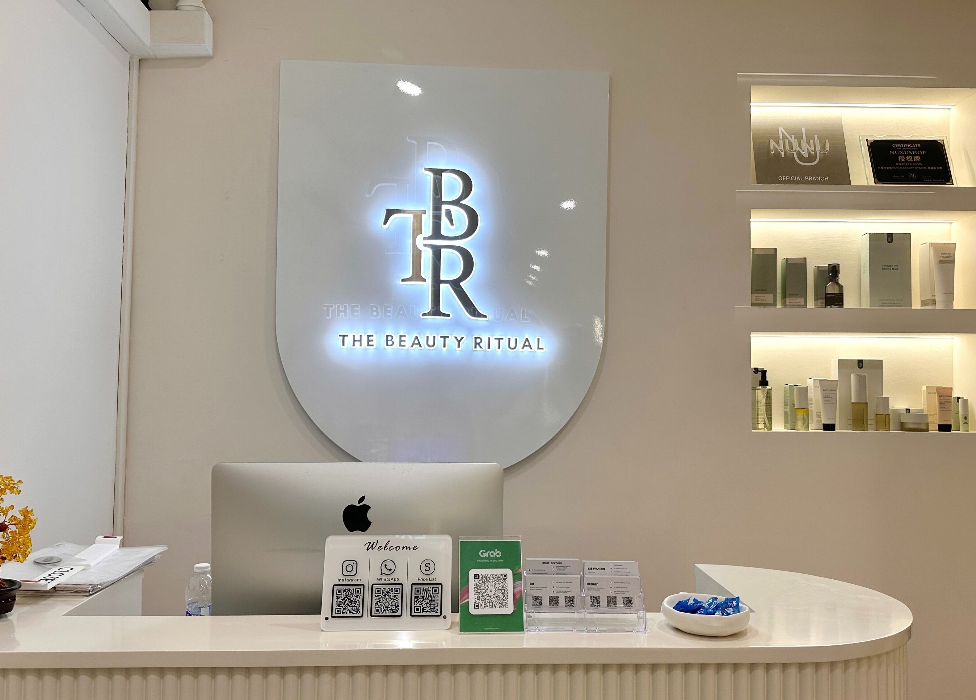 Reception desk at The Beauty Ritual Somerset (Killiney), showcasing a sleek design in Singapore, Singapore, SG.