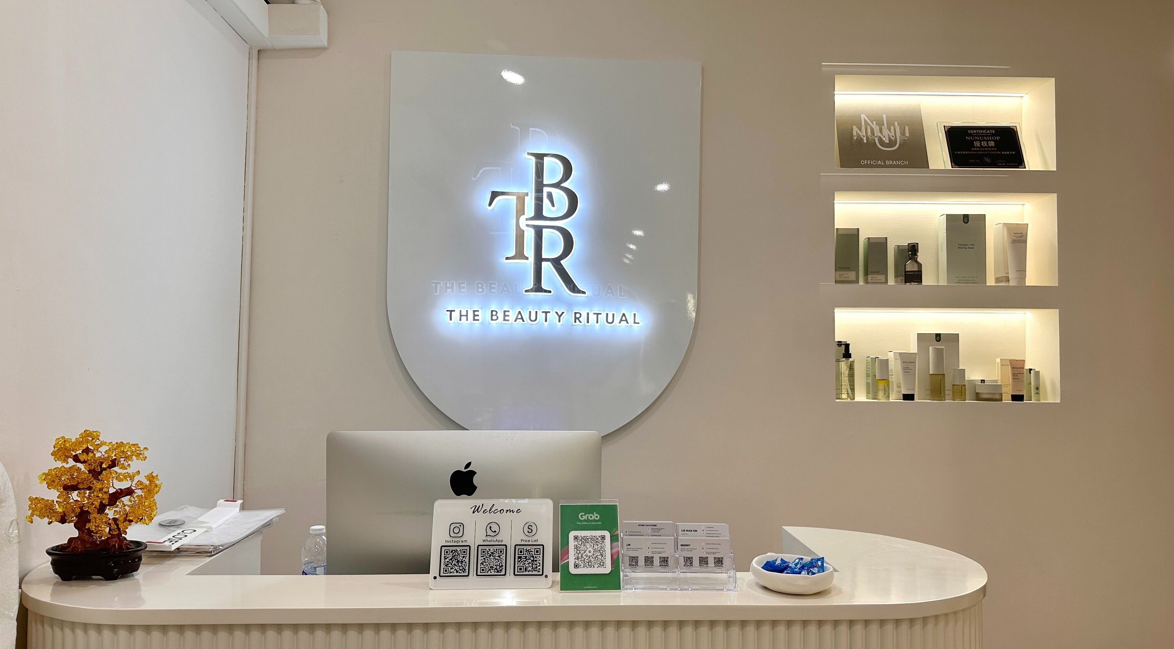 Reception desk at The Beauty Ritual Somerset (Killiney), showcasing a sleek design in Singapore, Singapore, SG.