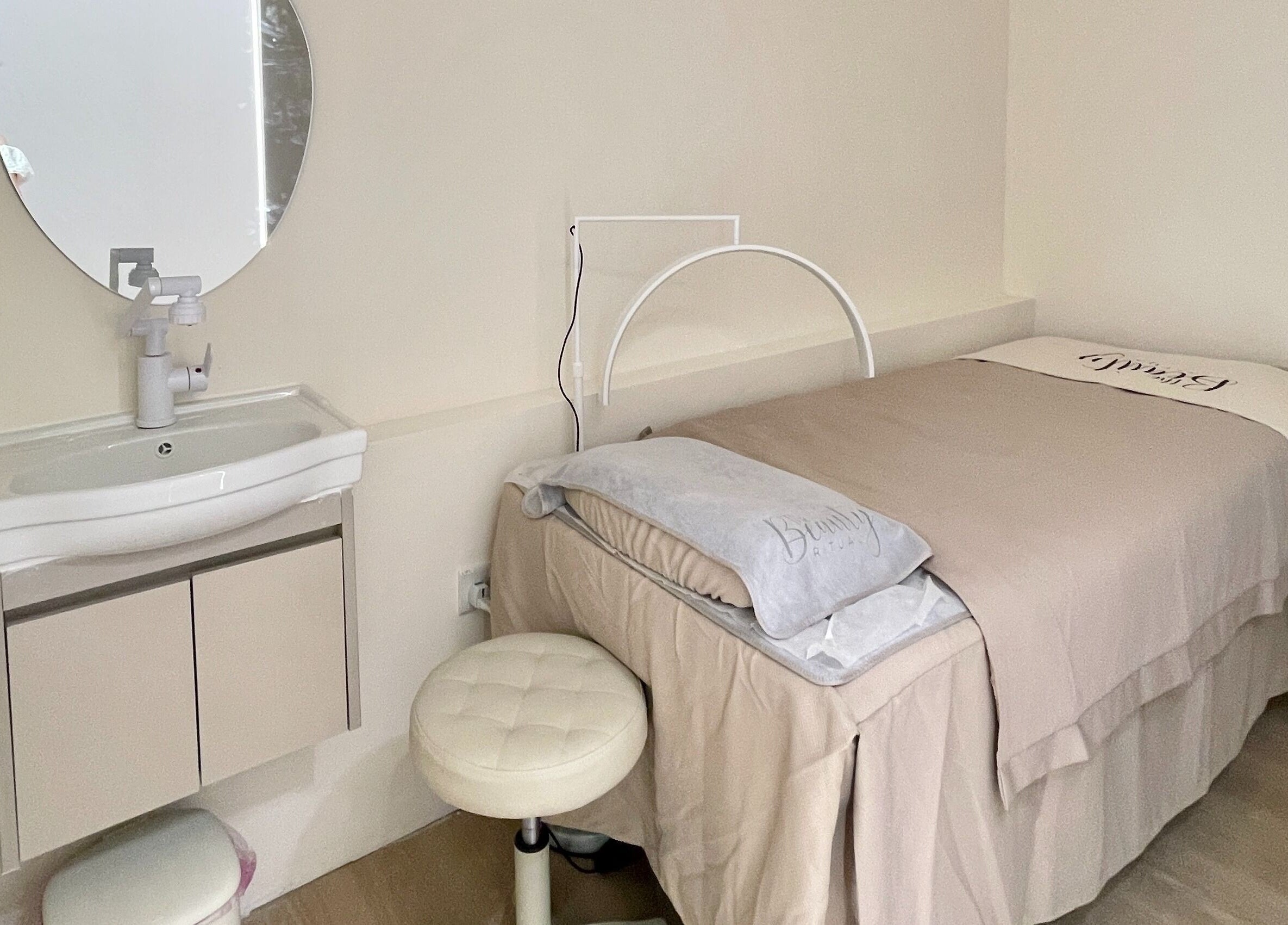 Tranquil treatment room at The Beauty Ritual Somerset (Killiney), Singapore, offering relaxation and wellness.