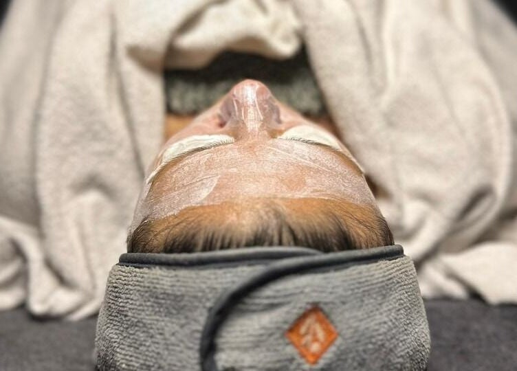 Relaxing facial treatment at Essence, Knysna, Western Cape, ZA, showcasing rejuvenating spa experience.