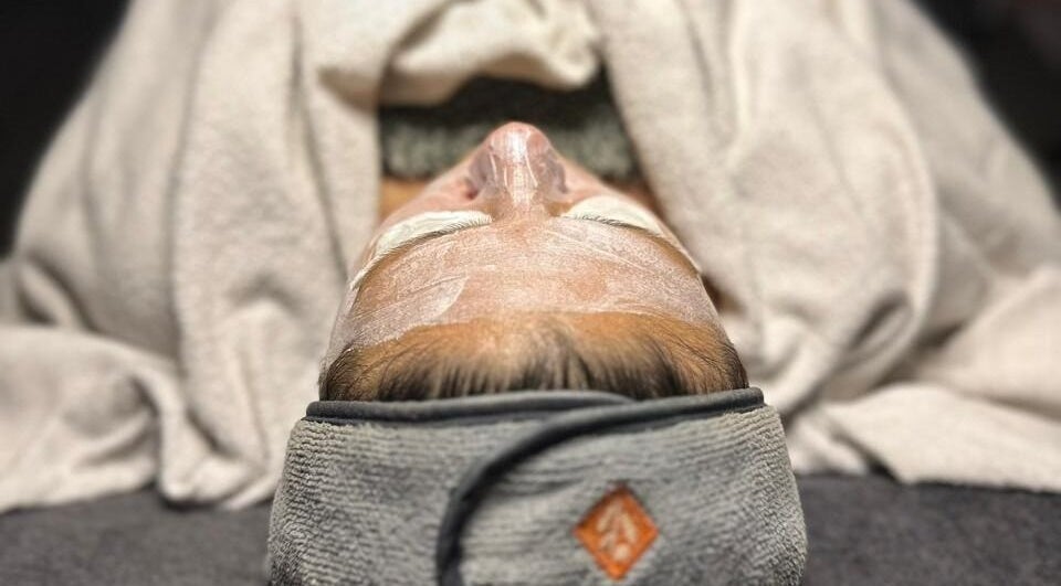 Relaxing facial treatment at Essence, Knysna, Western Cape, ZA, showcasing rejuvenating spa experience.