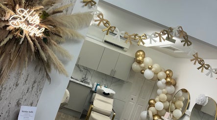 Elegant interior of The Hair Studio in Banbury, England with stylish decor and a luxury hair wash station.