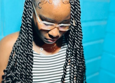 Kalis Hair Lab in Saint John, Antigua and Barbuda, DM showcases intricate twisted braids style.
