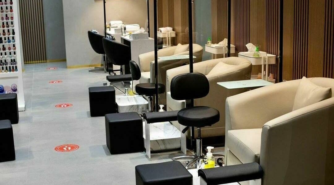 Elegant nail care seating at Sasha Beauty Salon Vida Hills - SHB, Dubai, AE, enhancing wellness experience.
