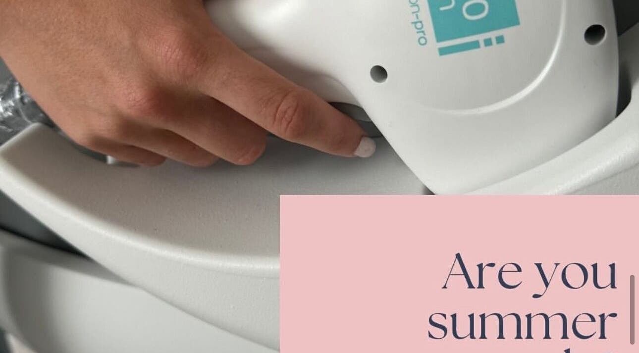 Close-up of a hand using laser equipment at Southern Laser Carterton, Carterton, England, GB.