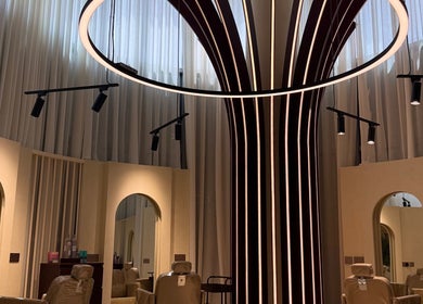 HOSH - House Of Shroug Salon in Riyadh, SA features a luxurious interior with modern lighting and plush seating.