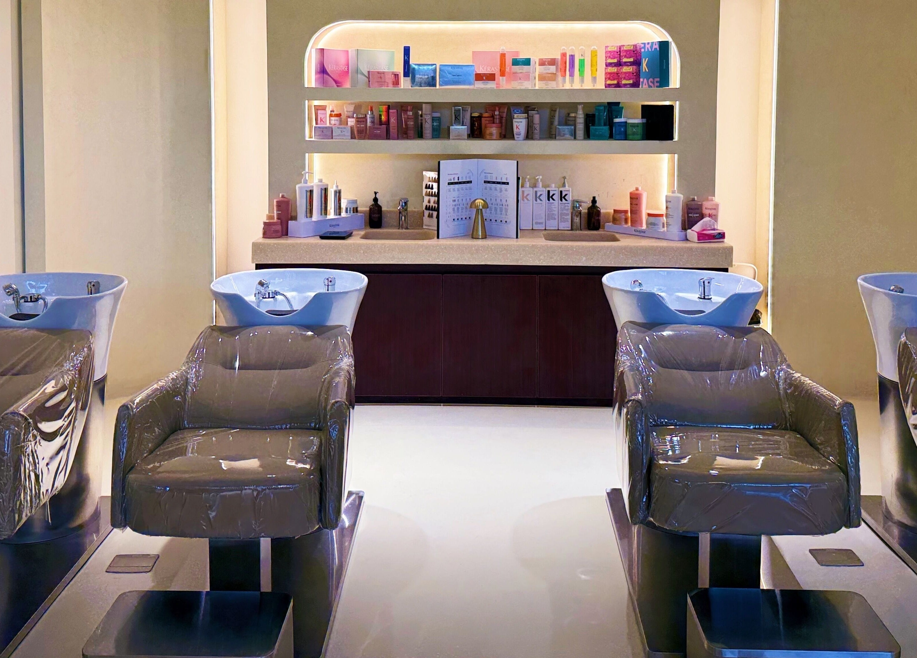 Elegant wash stations at HOSH - House Of Shroug Salon, Riyadh, SA, offering premium beauty services.