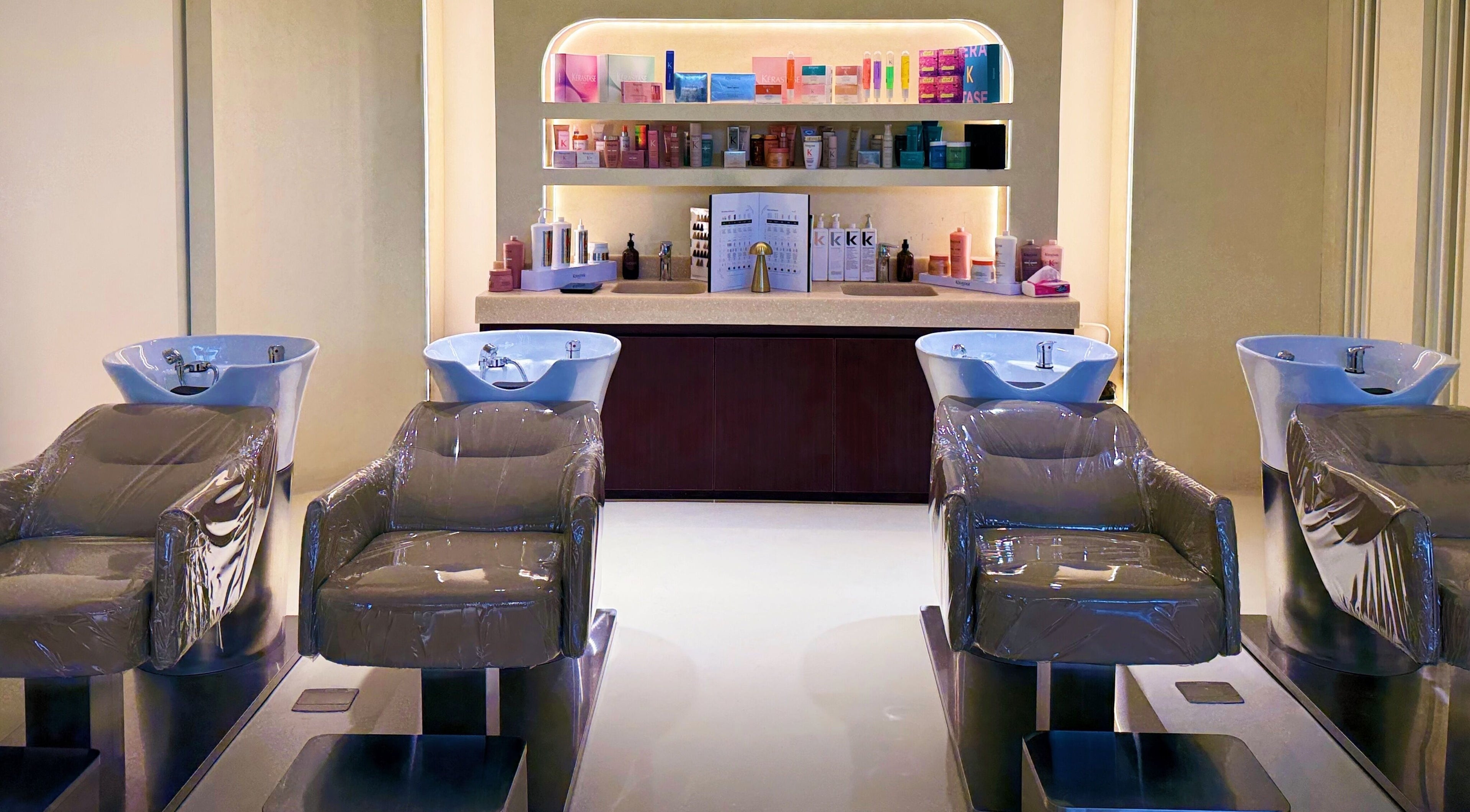 Elegant wash stations at HOSH - House Of Shroug Salon, Riyadh, SA, offering premium beauty services.
