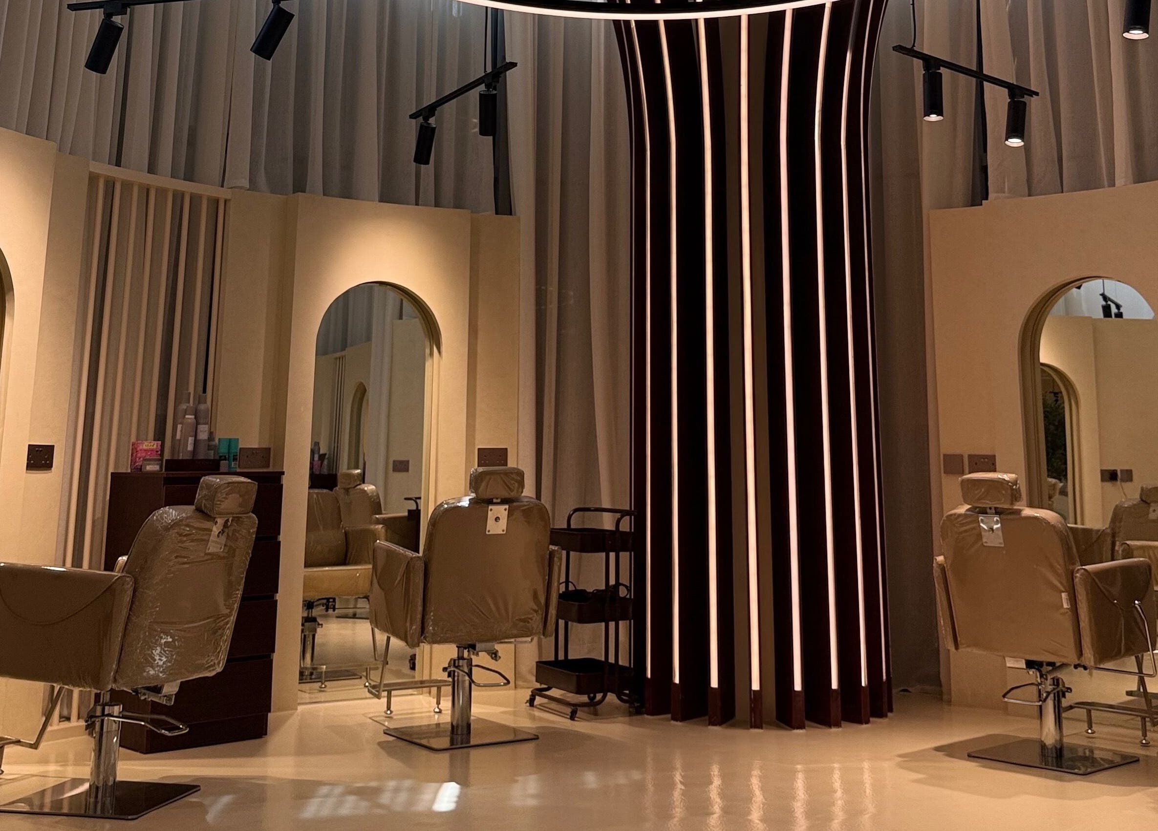 Chic and modern interior of HOSH - House Of Shroug Salon in Riyadh, SA, featuring stylish salon chairs.