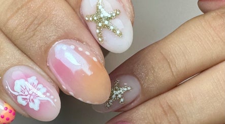 Elegant starfish nail art at Get Frenched, Chesterfield, England, GB showcasing intricate designs and vibrant colors.