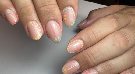 Colorful floral nail art at Get Frenched, Chesterfield, England, GB showcases intricate designs.