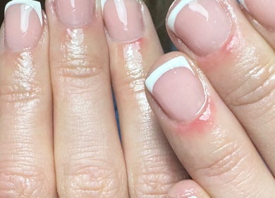 French manicure at Get Frenched, Chesterfield, England, GB. Clean, glossy nails with classic white tips.