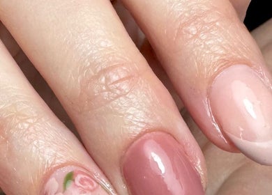 Elegant pink manicure with floral accent at Get Frenched, Chesterfield, England, GB.