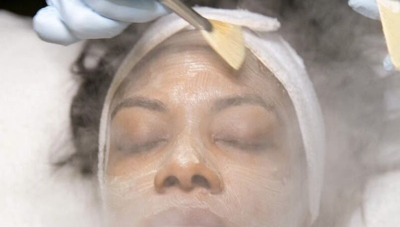 Woman receiving facial treatment at Ustoria Lounge, Port of Spain, Port of Spain Corporation, TT.