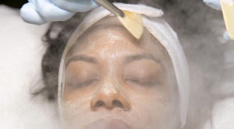 Woman receiving facial treatment at Ustoria Lounge, Port of Spain, Port of Spain Corporation, TT.