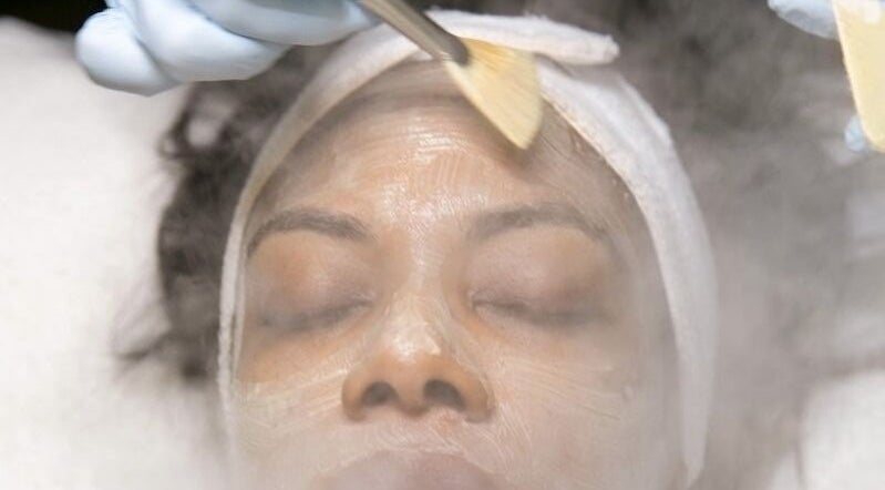 Woman receiving facial treatment at Ustoria Lounge, Port of Spain, Port of Spain Corporation, TT.