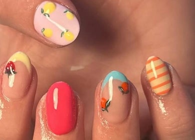 Colorful nail art with fruits and stripes at LP Extensions, Fordingbridge, England, GB.
