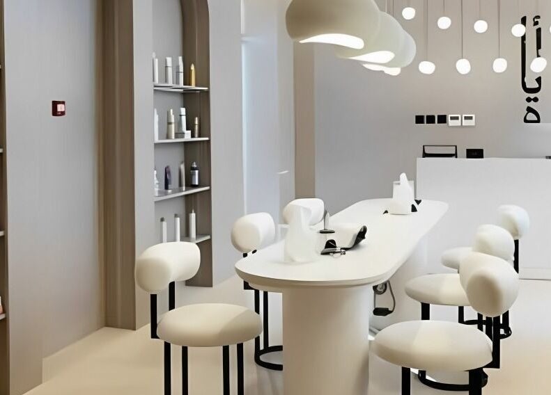 Modern and elegant interior of Anat Beauty Spa & Saloon, Sharjah, AE with stylish seating and lighting.