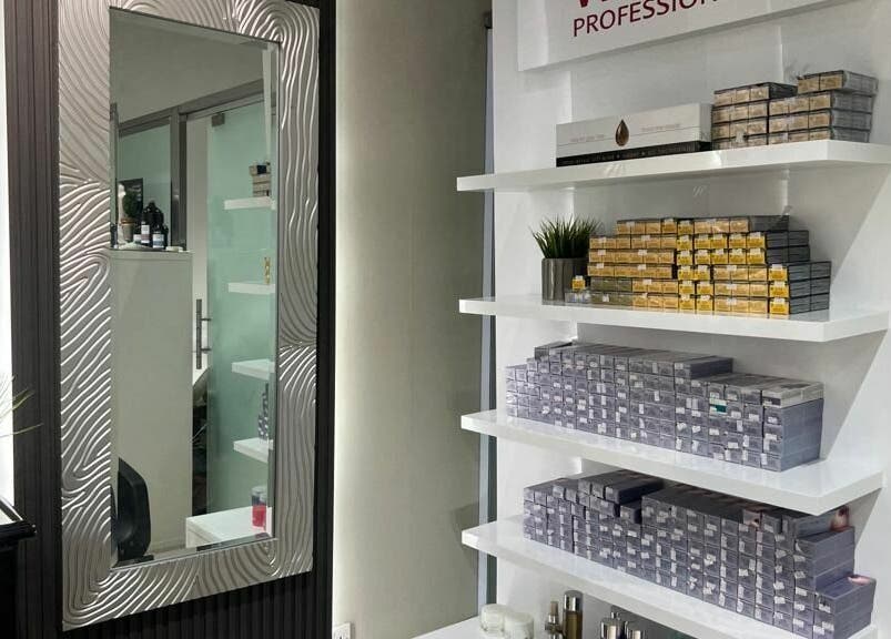 Product shelves with beauty supplies at Al Jamila Salon, Al Mubarraz, Eastern Province, SA.