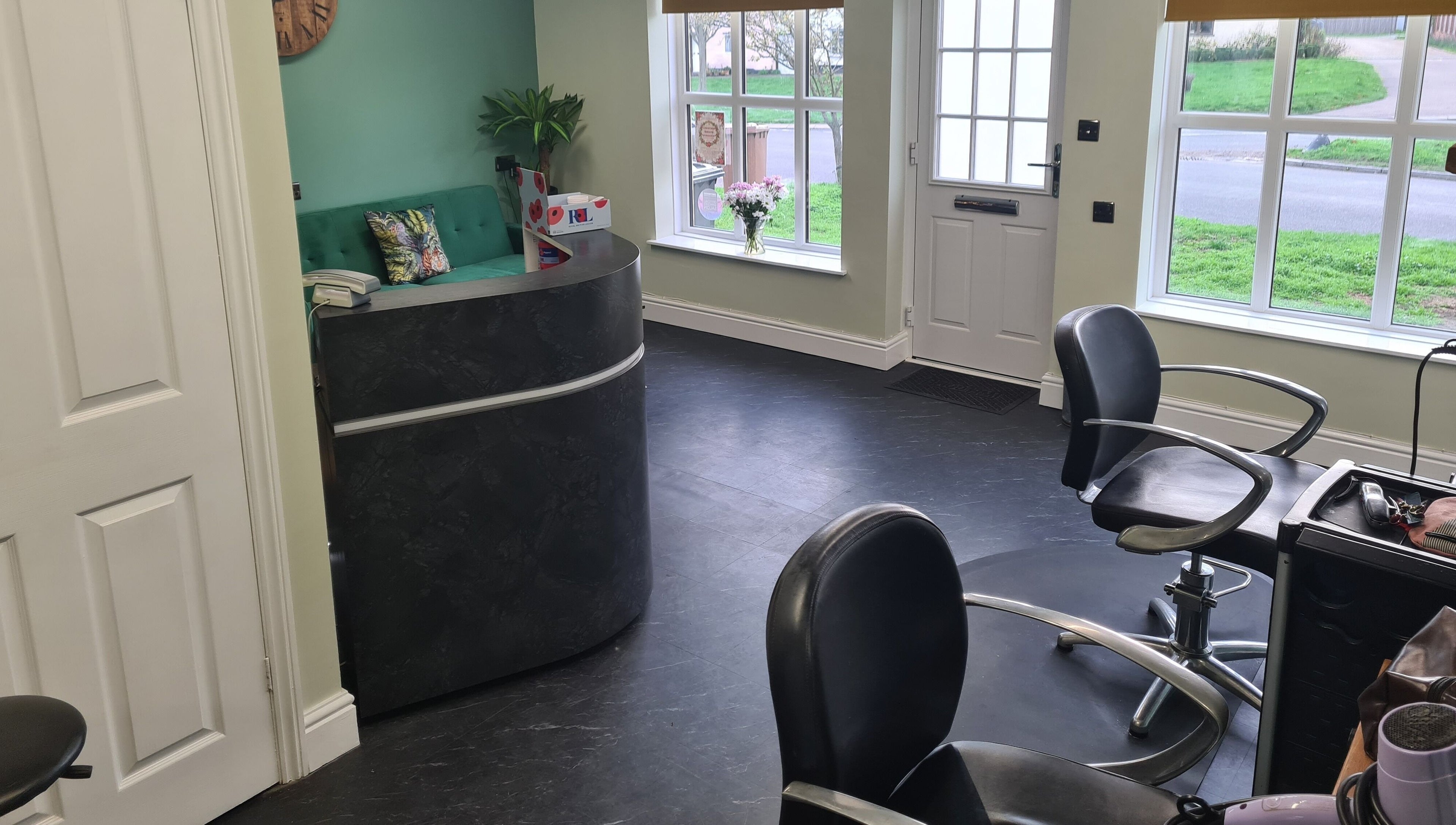 The Green Lounge reception area with modern decor in Haughley, England, GB, welcoming clients.