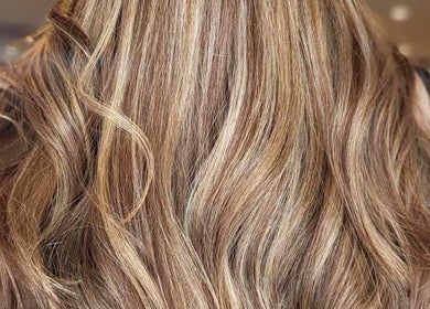 Beautiful wavy blonde hair styled at Hair by Katrina The Hair Barn in Hereford, England, GB.