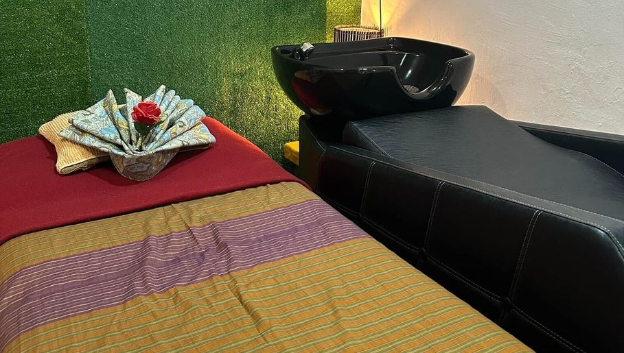 Massage bed with elegant decor at Fit Hijama, Johor, Johor, MY, offering a serene wellness experience.