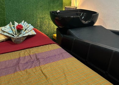 Massage bed with elegant decor at Fit Hijama, Johor, Johor, MY, offering a serene wellness experience.