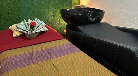 Massage bed with elegant decor at Fit Hijama, Johor, Johor, MY, offering a serene wellness experience.
