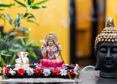 Sacred statues adorn Exotic Indian Salon Richmond in New South Wales, AU, creating a serene ambiance.